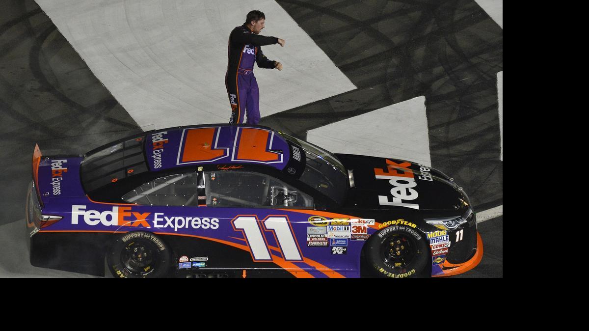 
Denny Hamlin celebrates his win in the NASCAR Sprint All-Star Race at Charlotte Motor Speedway, Saturday, May 16, 2015.
