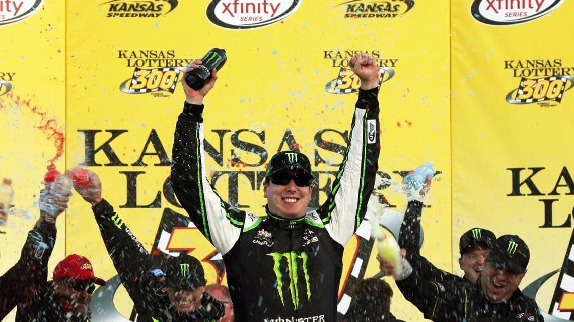 
Kyle Busch, celebrates in Victory Lane after winning Saturday’s NASCAR XFINITY Series Kansas Lottery 300 at Kansas Speedway. 
