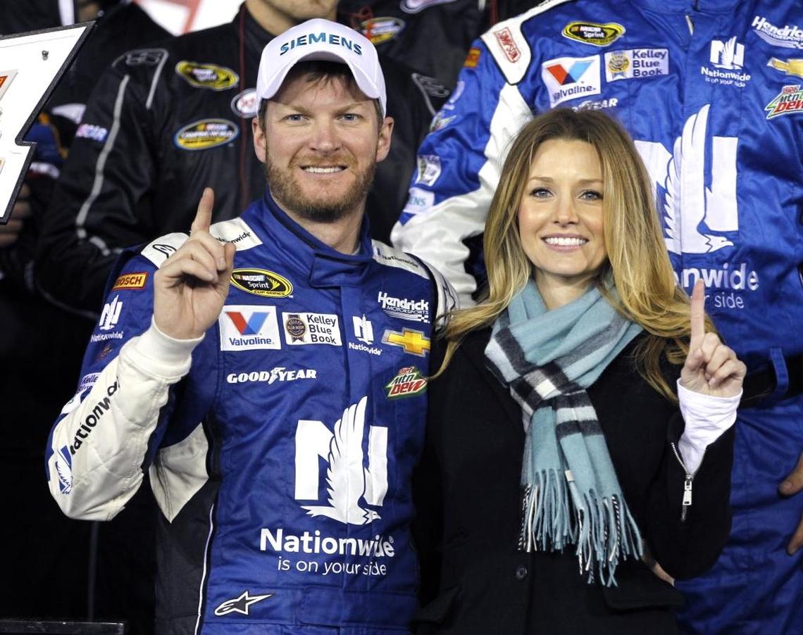 NASCAR icon Dale Earnhardt Jr., seen here in this file photo with his wife, Amy, has expanded his partnership with Charlotte-based Bojangles.