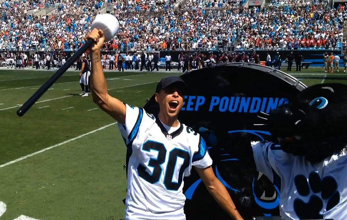 NBA Champion and MVP Stephen Curry rallies Carolina Panthers fans after hitting the Keep Pounding drum prior to the game against the Houston Texans at Bank of America Stadium on Sunday, September 20, 2015. The Panthers won, 24-17.