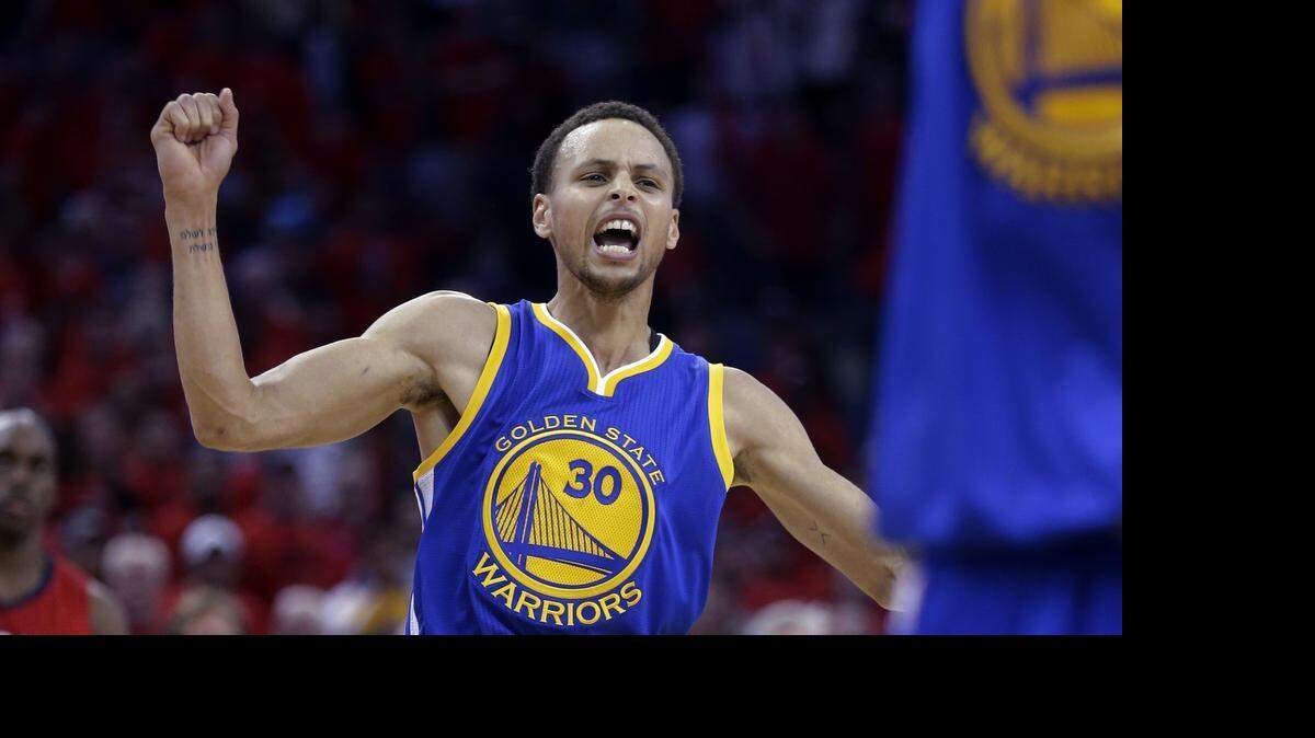
Golden State Warriors guard Stephen Curry celebrates the Warriors' 123-119 overtime victory over the New Orleans Pelicans in Game 3 of a first-round NBA basketball playoff series in New Orleans, Thursday, April 23, 2015. The Warriors took a 3-0 lead in the best-of-seven series. (AP Photo/Gerald Herbert)
