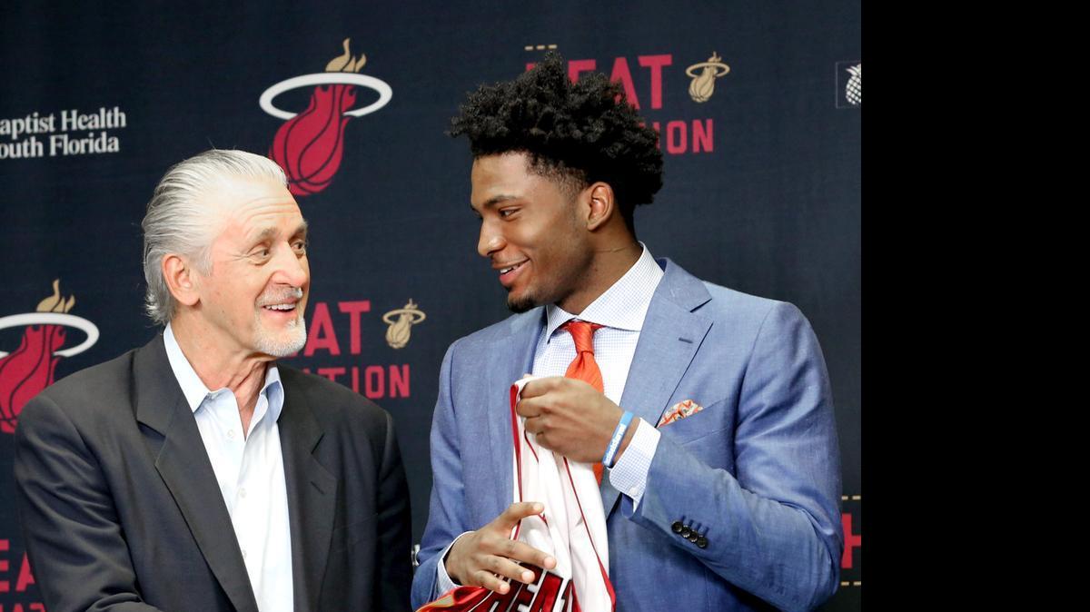 
Miami Heat president Pat Riley, left, has a moment with Justise Winslow during the introduction of the new rookie on Monday, June 29, 2015, at AmericanAirlines Arena in Miami. Winslow was the team's top draft pick. 
