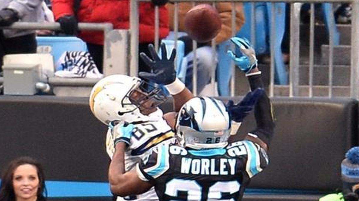 Carolina Panthers cornerback Daryl Worley (26) disrupts a pass reception attempt by San Diego Chargers tight end Antonio Gates in the third quarter on Sunday. The Panthers defeated the Chargers 28-16.