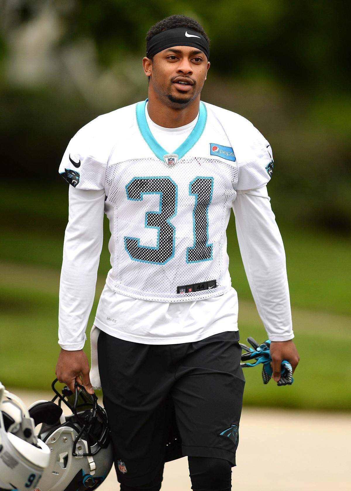 Carolina Panthers cornerback Lorenzo Doss walks to minicamp practice on Tuesday, June 12, 2018.