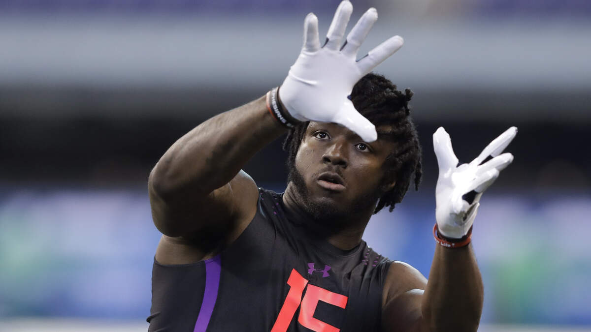 Indiana tight end Ian Thomas runs a drill at the NFL football scouting combine, Saturday, March 3, 2018, in Indianapolis. (AP Photo/Darron Cummings)