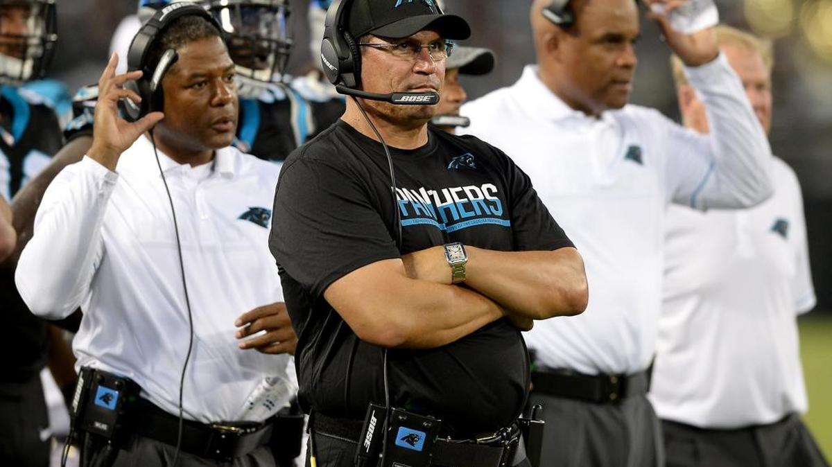 Carolina Panthers coach Ron Rivera, middle, watches the defense battle the Baltimore Ravens during last week’s exhibition in Baltimore. Rivera was forced to intervene during practice Sunday when the action got a little too heated. The players dialed it back Monday, much to Rivera’s relief. “Made me feel a lot better, too,” Rivera said.