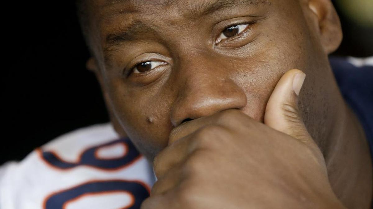Denver Broncos defensive end Antonio Smith discusses his father’s death with media Thursday.