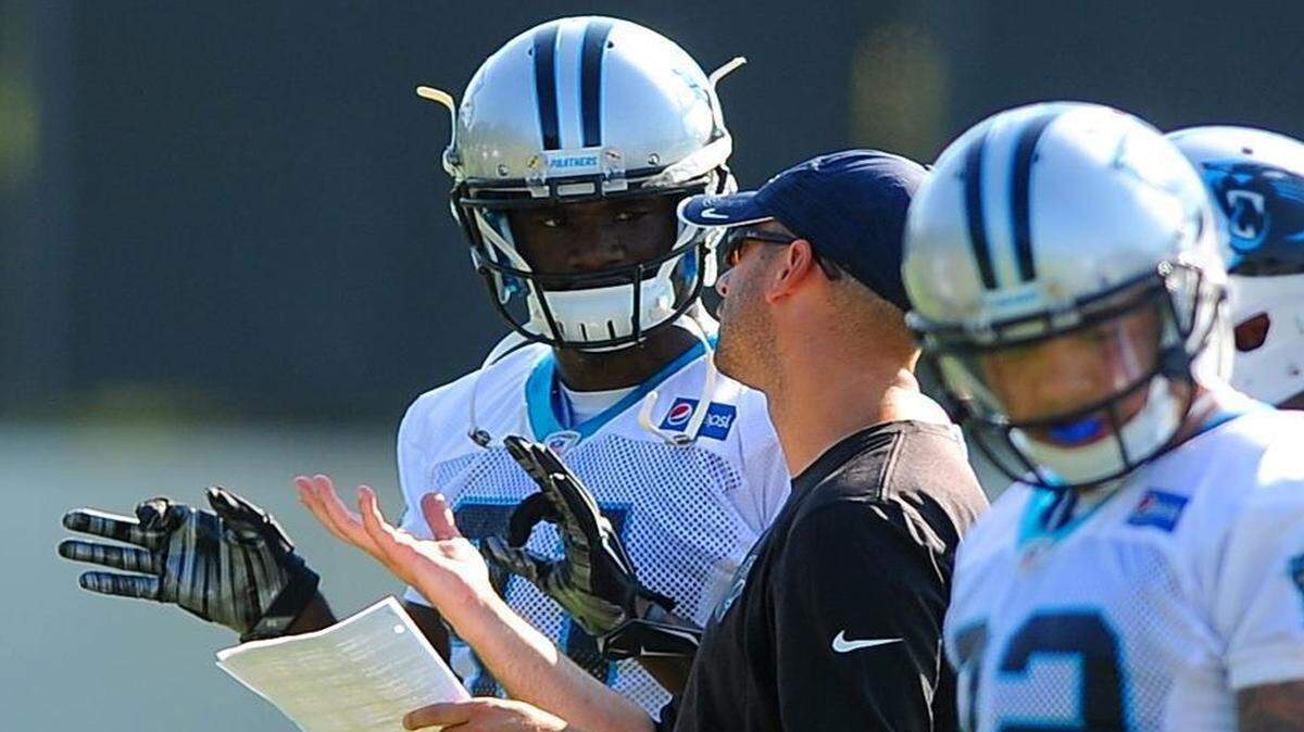 
Carolina Panthers wide receiver Kevin Norwood, left, receives instructions from assistant wide receivers coach Cameron Turner during practice on Tuesday. Norwood was traded to the Panthers by Seattle on Monday.
