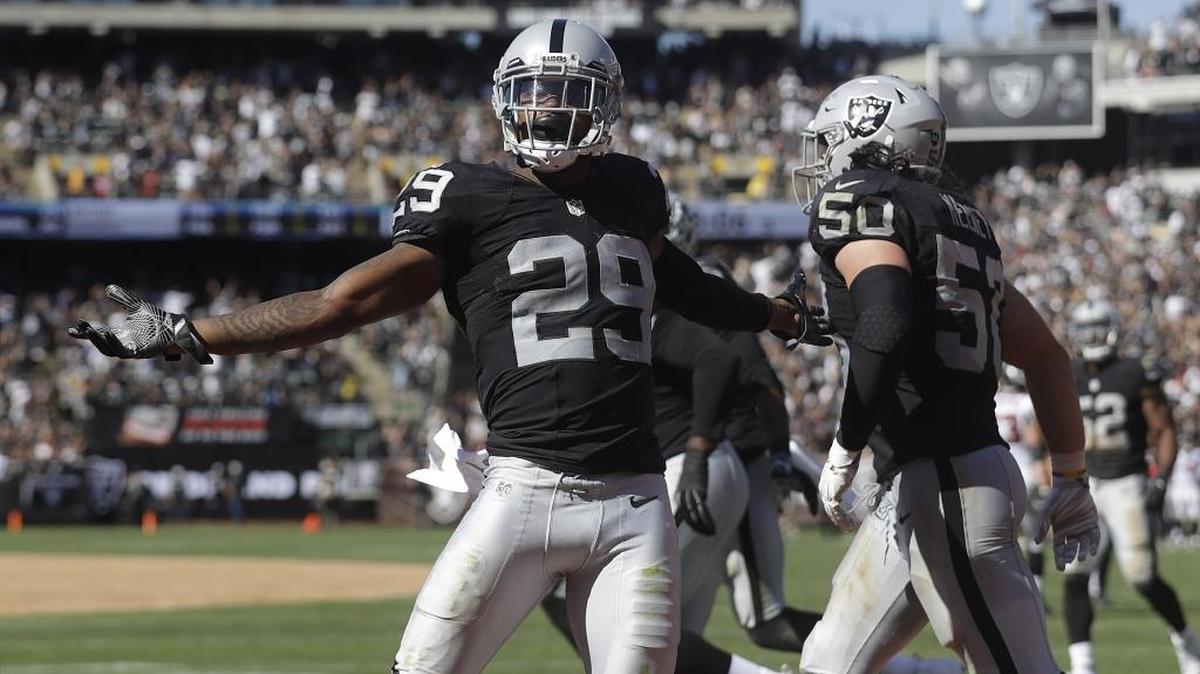 Former N.C. State cornerback David Amerson (29), now with the Oakland Raiders, says he has a mental list of every quarterback he has intercepted – and he wants to add Cam Newton on Sunday.