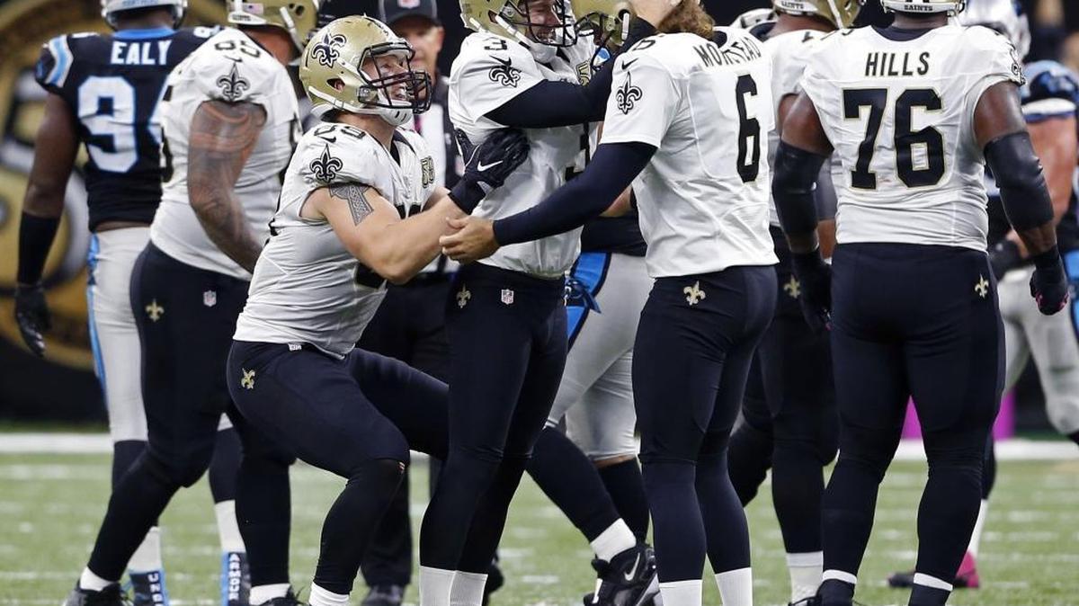 New Orleans Saints kicker Wil Lutz (3) celebrates after kicking the winning field goal against the Carolina Panthers