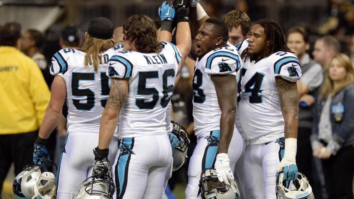 Carolina Panthers' Thomas Davis (58) huddles with the linebackers during pre game prior to playing the New Orleans Saints at the Mercedes-Benz Superdome on Sunday, December 6, 2015.