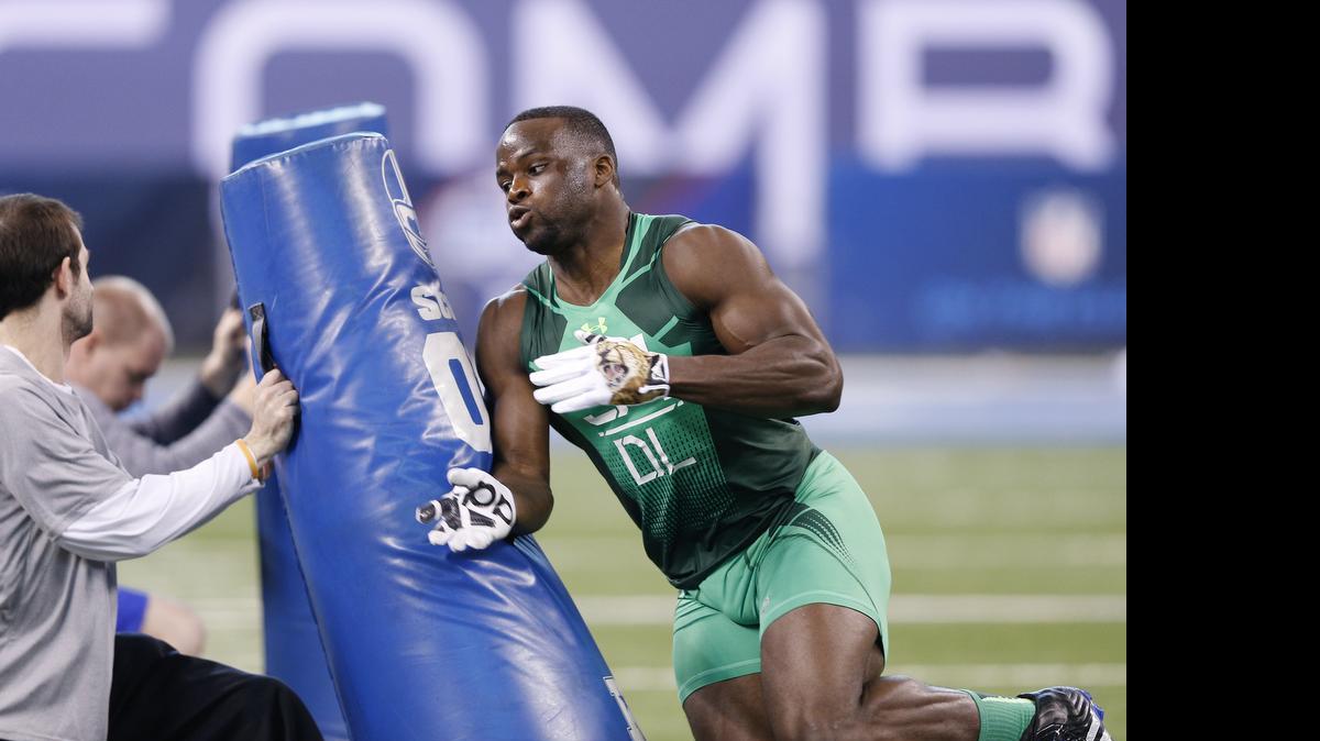 
Defensive lineman Owamagbe Odighizuwa of UCLA competes during the 2015 NFL Scouting Combine at Lucas Oil Stadium on February 22, 2015 in Indianapolis.
