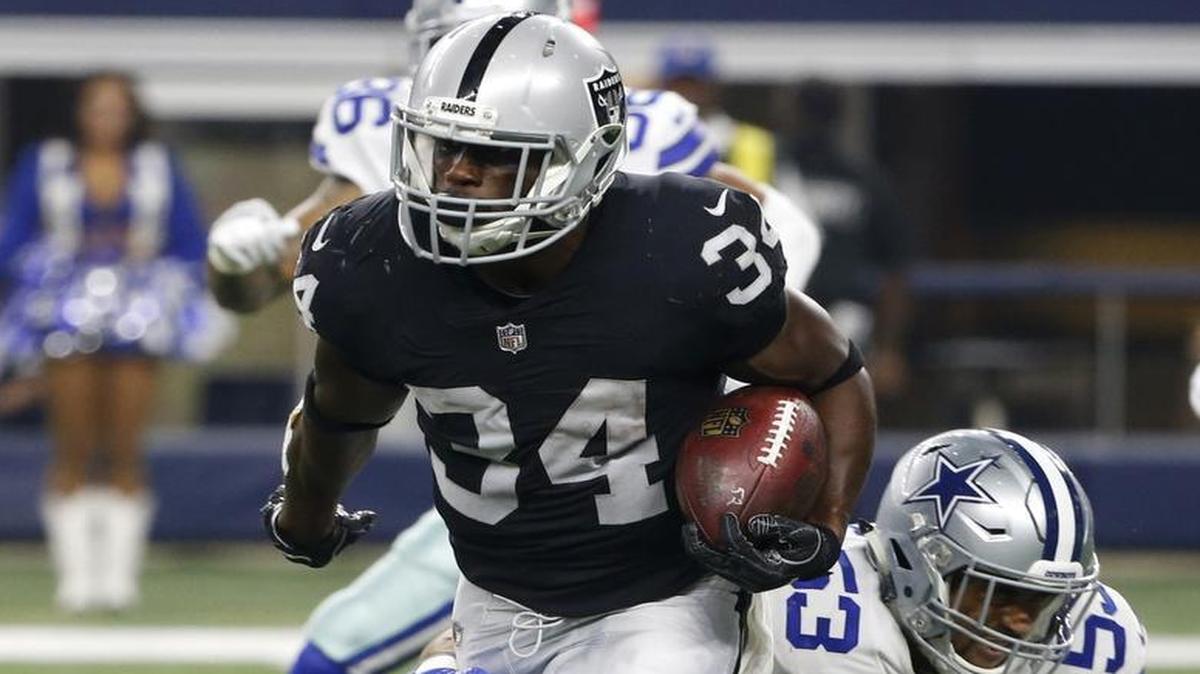 Former Charlotte Catholic and UNC running back Elijah Hood (34) had his best showing as a professional for the Oakland Raiders on Saturday against the Dallas Cowboys.