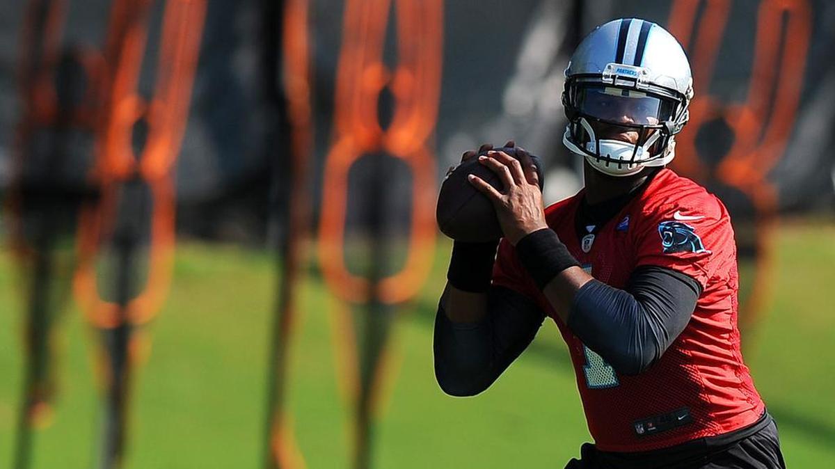 
Carolina Panthers quarterback Cam Newton drops back to pass during Tuesday’s practice.
