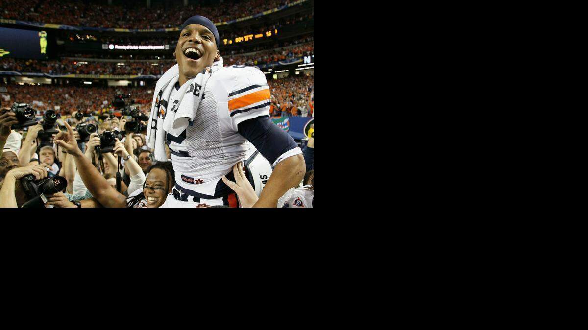 
Carolina Panthers quarterback Cam Newton has matured on and off the field since his days at Auburn, former Tigers coach Gene Chizik says. 
