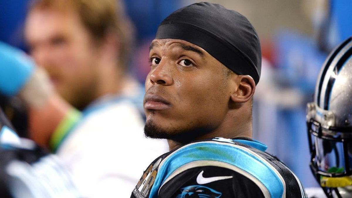 Carolina Panthers quarterback Cam Newton can only watch in the fourth quarter of Super Bowl 50 in Santa Clara, Calif., where the Panthers lost 24-10 to the Denver Broncos. After the game, Newton came under criticism for his demeanor during a news conference.