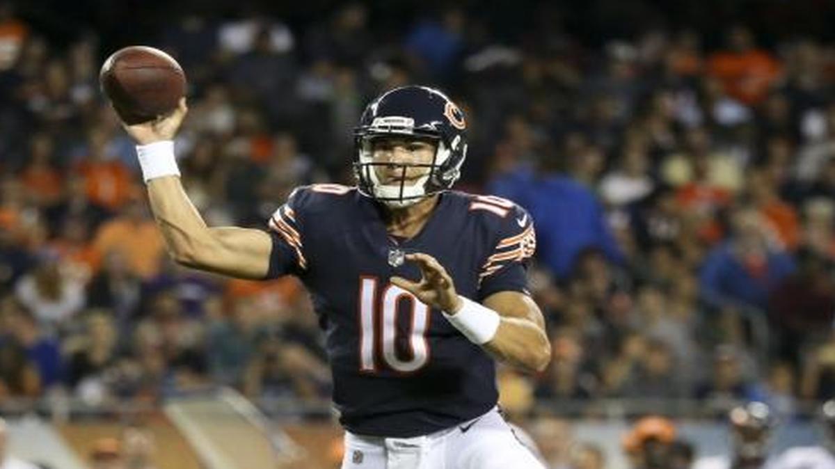 Chicago Bears quarterback Mitch Trubisky (10) throws a touchdown pass in his first NFL preseason game against the Denver Broncos.