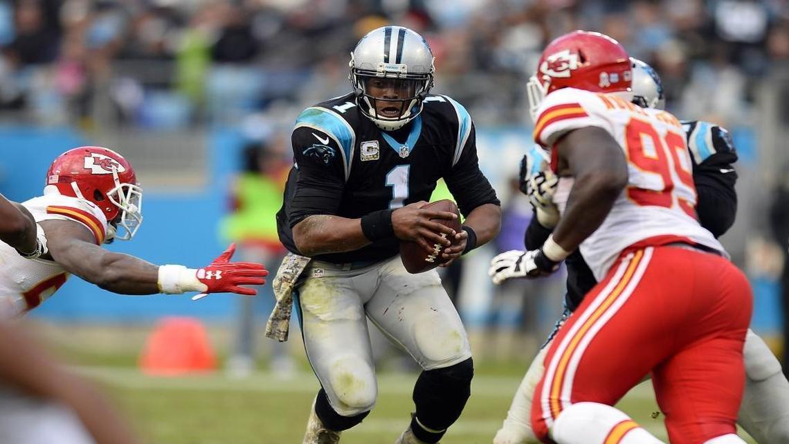 Carolina Panthers quarterback Cam Newton (1) looks to escape as Kansas City Chiefs defenders close in for a sack in the third quarter at Bank of America Stadium on Sunday. Kansas City won, 20-17.