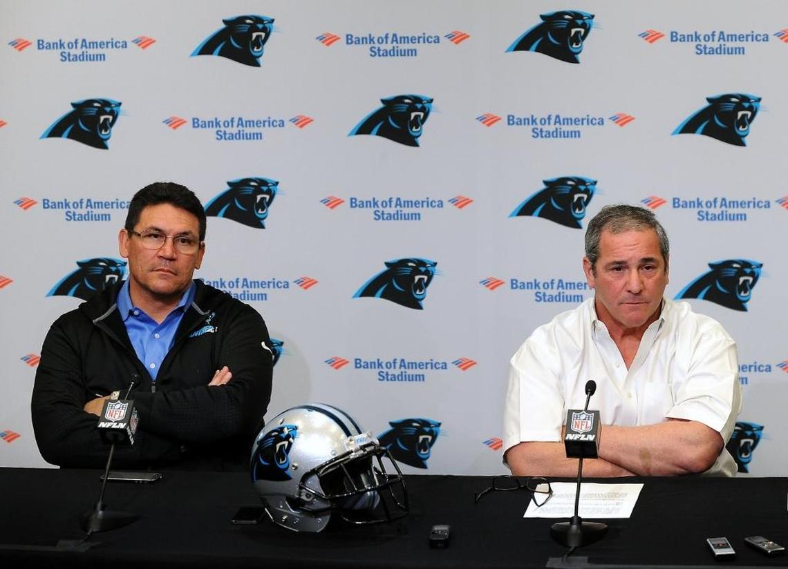 Carolina Panthers head coach Ron Rivera, left and general manager Dave Gettleman listen to a reporter's question in 2016. Rivera said Tuesday that Gettleman helped make him a better coach and praised the GM, who was fired by owner Jerry Richardson Monday.