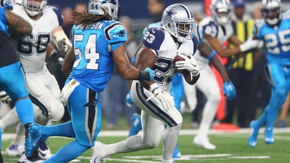 Robert Turbin (23) and the Dallas Cowboys never found much running room against the Carolina Panthers on Sunday. The Cowboys finished with 31 yards rushing.
