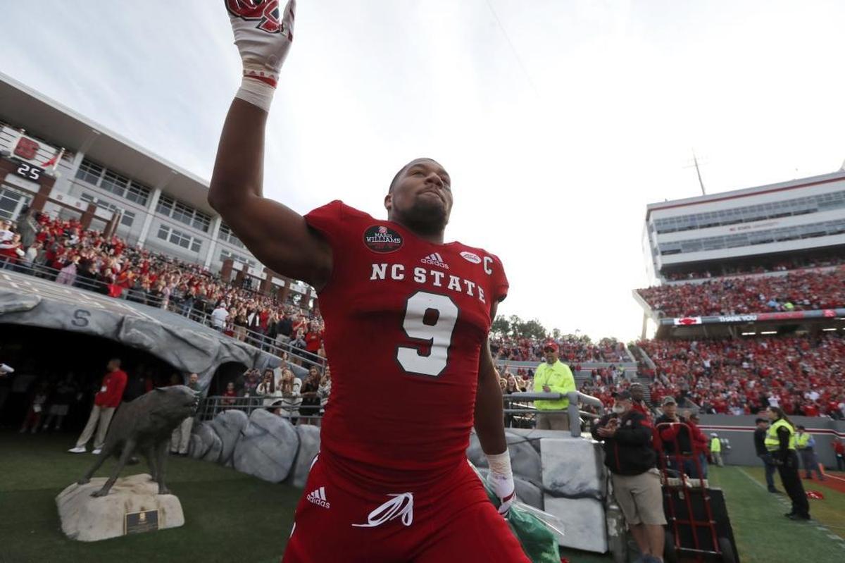 N.C. State defensive end Bradley Chubb (9) runs out onto the field after being introduced on senior day before the Wolfpack's game against UNC at Carter-Finley Stadium in Raleigh, N.C., Saturday, Nov. 25, 2017. Chubb may go as high as third overall in this year’s NFL Draft.