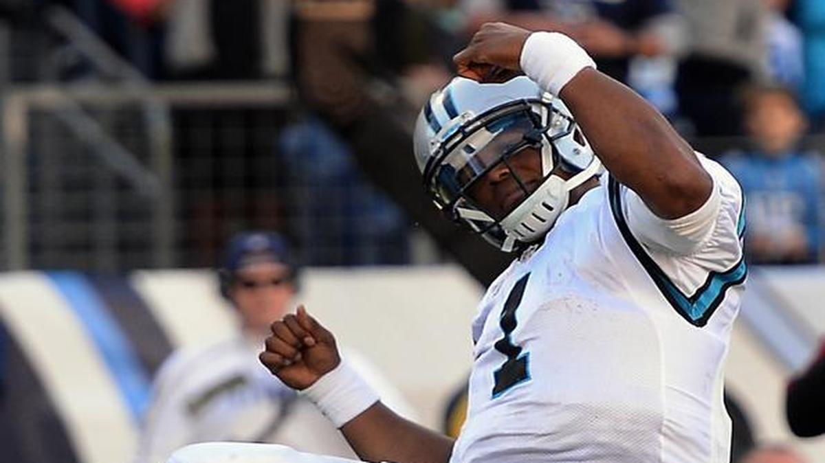 Carolina Panthers quarterback Cam Newton celebrates his touchdown run vs the Tennessee Titans during late fourth quarter acton at Nissan Stadium in Nashville, TN. on Sunday, November 15, 2015. The Panthers defeated the Titans 27-10.