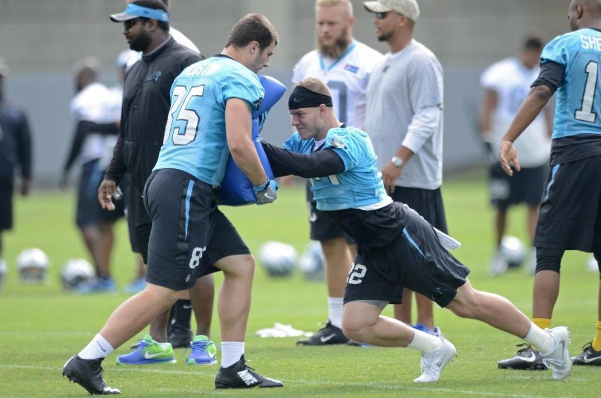Carolina Panthers first-round draft pickChristian McCaffrey, right, missed OTAs and all but the final day of minicamp because of the NFL’s stupid quarter-system rule.