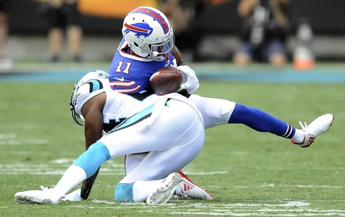 Carolina Panthers cornerback James Bradberry (24) dislodges the ball from Buffalo Bills wide receiver Zay Jones (11) in the second half of Sunday’s game at at Bank of America Stadium.
