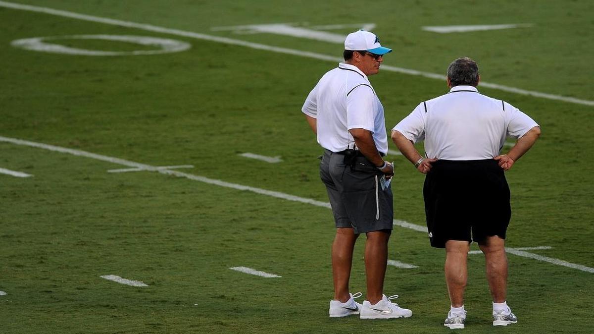 
Carolina Panthers general manager Dave Gettleman (right) and head coach Ron Rivera have taken the team to the playoffs in consecutive seasons for the first time in franchise history. Gettleman’s view is that those are only steps on a championship path.
