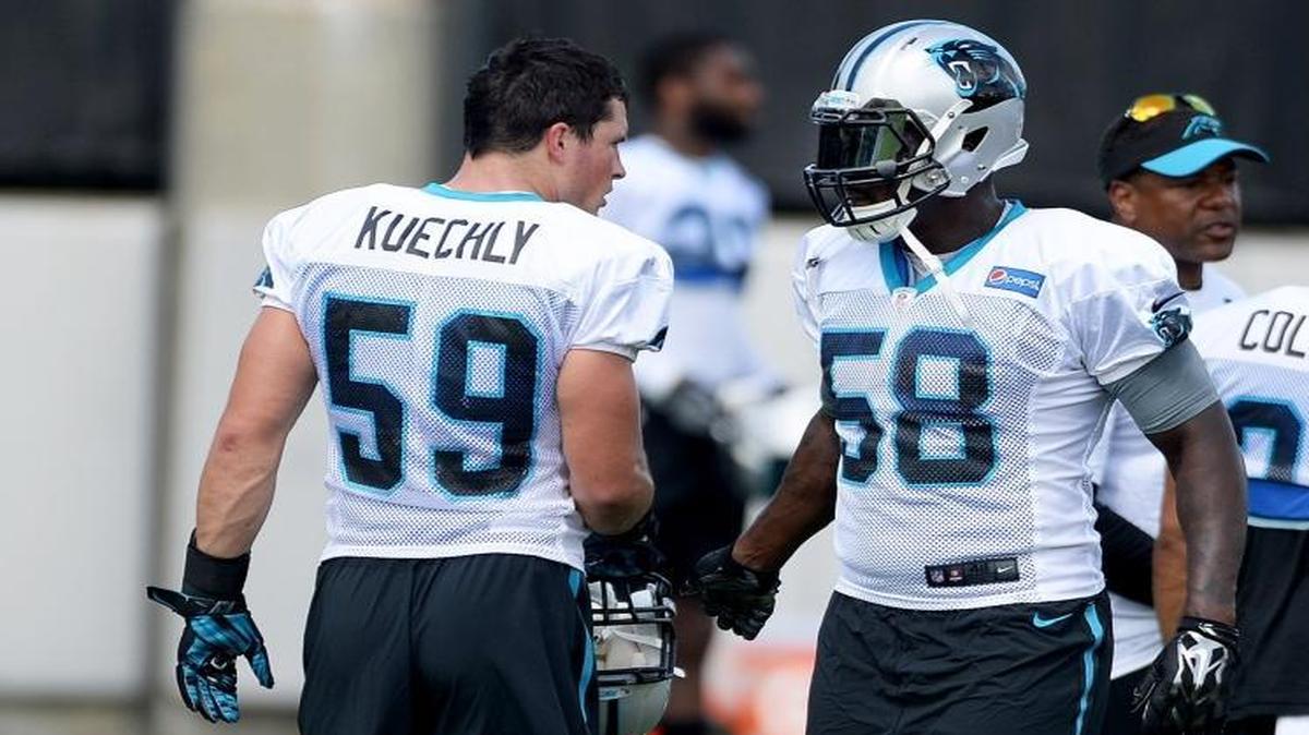Luke Kuechly greets Thomas Davis during Thursday’s Panthers practice in Charlotte. Saturday, Kuechly will get his first chance to make a full-speed tackle since Super Bowl 50.