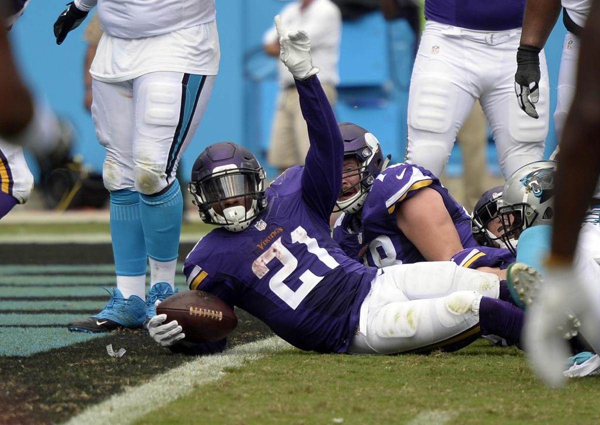 Minnesota Vikings running back Jerick McKinnon (21) celebrates scoring a two-point conversion against the Carolina Panthers in the second half at Bank of America Stadium on Sunday, September 25, 2016. The Vikings won, 22-10.