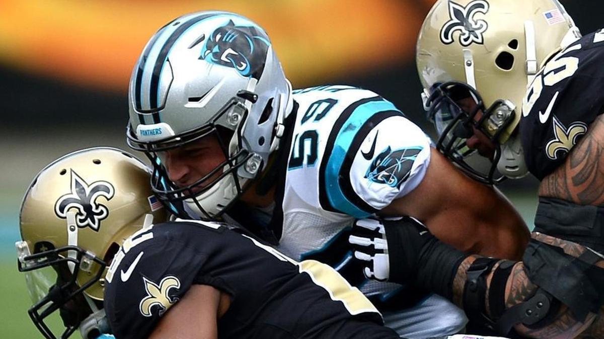 New Orleans Saints coach Sean Payton said he and his coaches have to come up with some trickery Sunday, out of familiar formations, because Carolina Panthers linebacker Luke Kuechly (59) is so expert at anticipating opponent plays pre-snap.