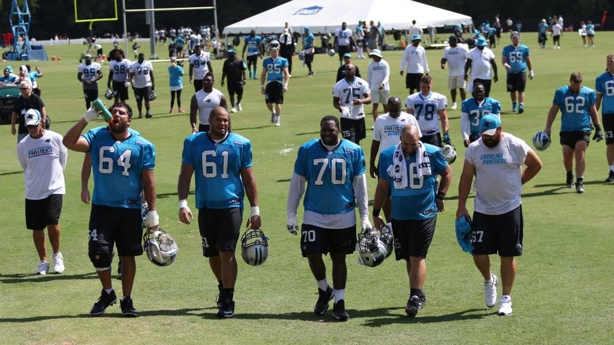 The Carolina Panthers walk off the practice fields at Wofford on Tuesday, the final day of training camp in Spartanburg. Team president Danny Morrison said this year’s camp drew 135,000 fans over 14 practices, almost double the draw from last year.