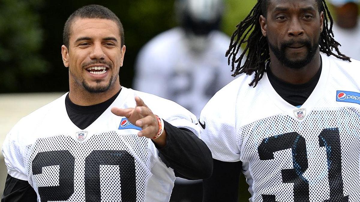 
Carolina Panthers safety Kurt Coleman, left, and cornerback Charles Tillman walk to practice last month. Coleman signed a two-year deal with the Panthers during the offseason and will compete with Roman Harper at strong safety.
