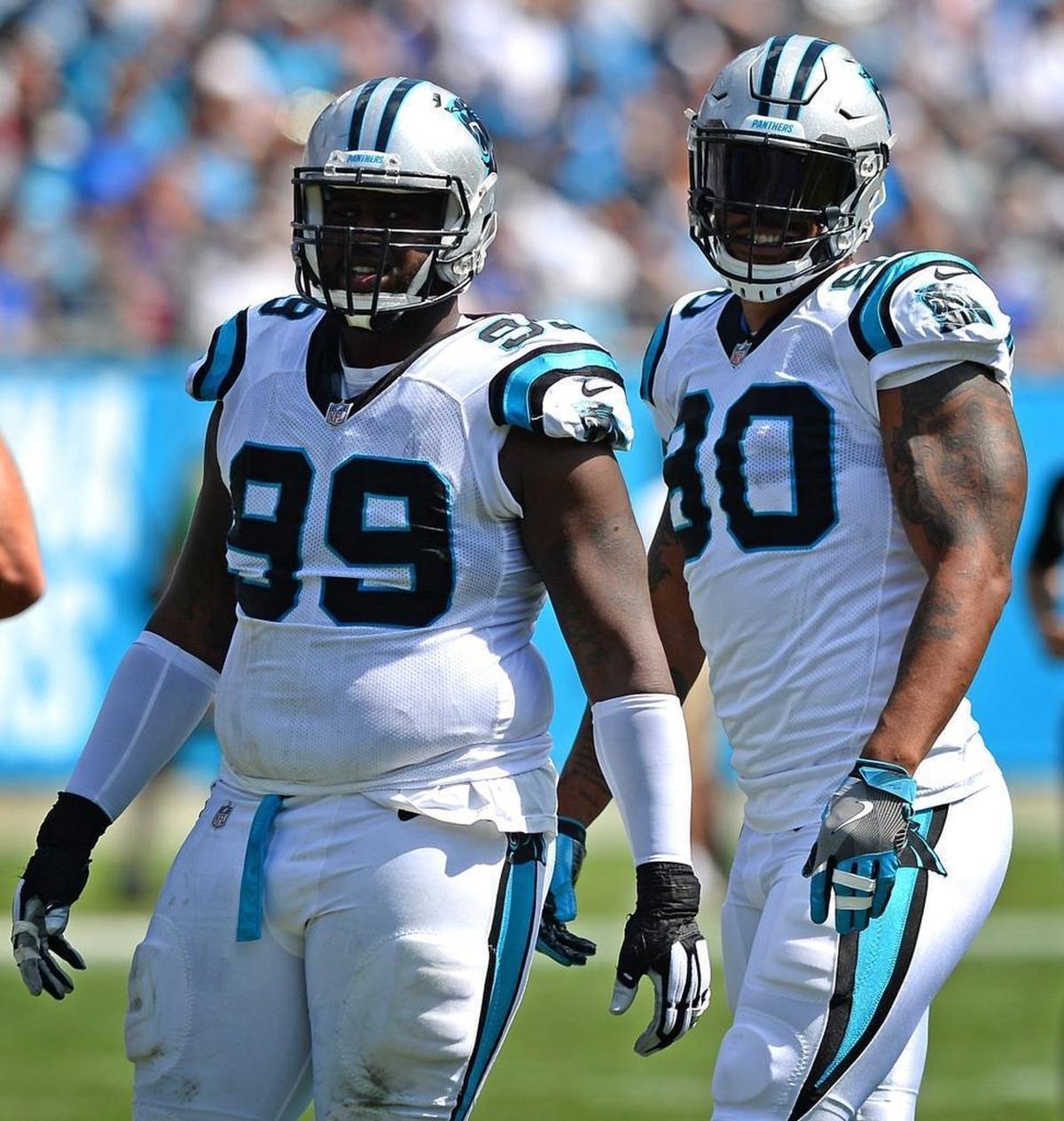 The Carolina Panthers defensive line, including tackle Kawann Short, left, and end Julius Peppers, right, has been a force so far. It’ll face a stout Falcons offensive line on Sunday in Charlotte.