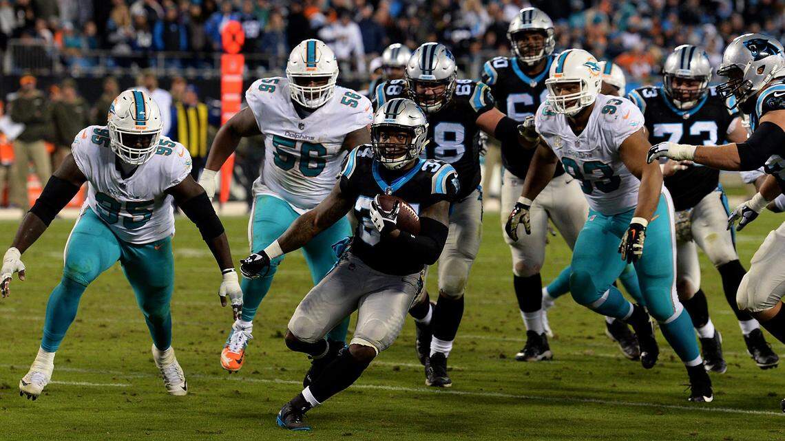 Carolina Panthers running back Cameron Artis-Payne rushes for a touchdown against the Miami Dolphins during third quarter action on Monday, November 12, 2017, at Bank of America Stadium in Charlotte, NC.