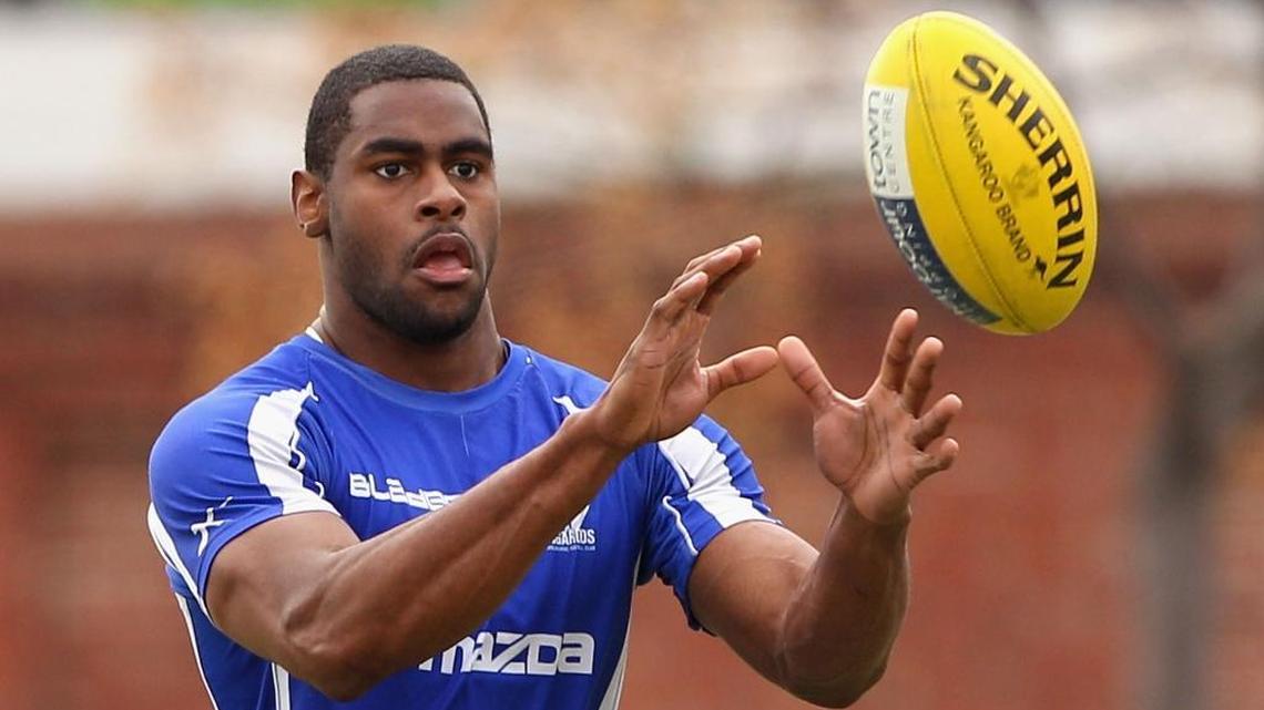 Eric Wallace played Australian Rules Football for the North Melbourne Kangaroos after playing college basketball at Ohio State, DePaul and Seattle University. He hasn’t played American football since eighth grade in Winston-Salem.