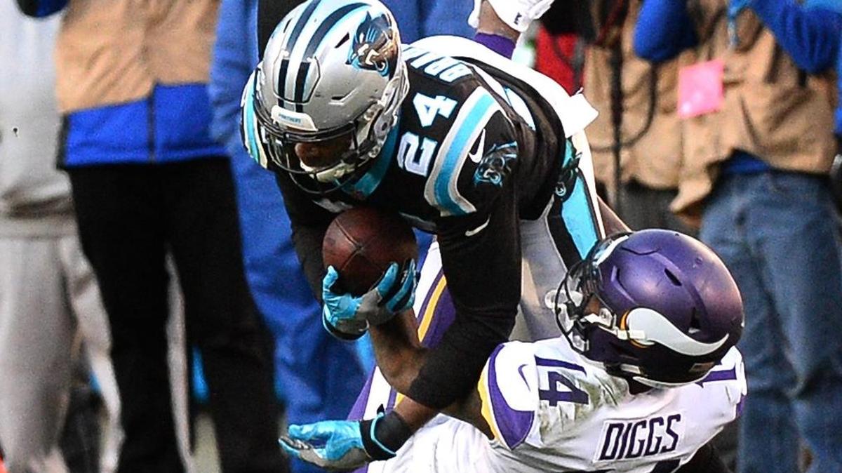 Carolina Panthers cornerback James Bradberry, left, intercepts a pass meant for Minnesota Vikings wide receiver Stefon Diggs, right, during fourth quarter action on Sunday, December 10, 2017 at Bank of America Stadium in Charlotte, NC.