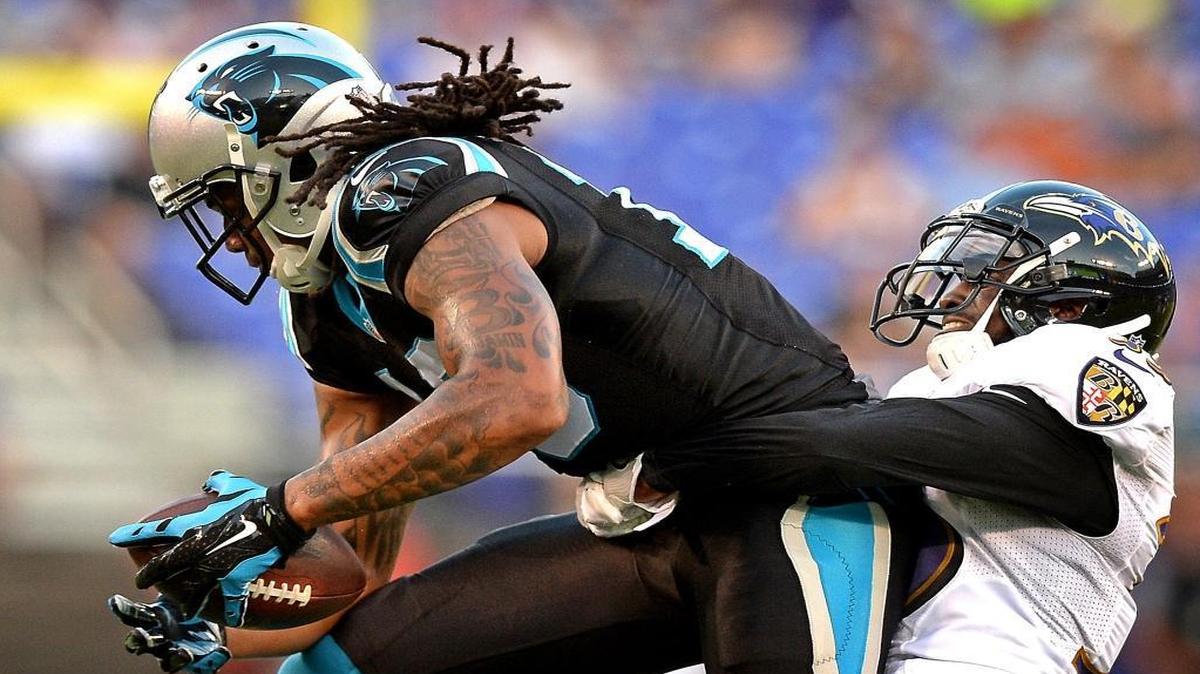 Carolina Panthers wide receiver Kelvin Benjamin, left, catches a pass from quarterback Cam Newton as Baltimore Ravens cornerback Shareece Wright, right, looks to make the tackle during Thursday’s preseason game in Baltimore. The Panthers lost 22-19.