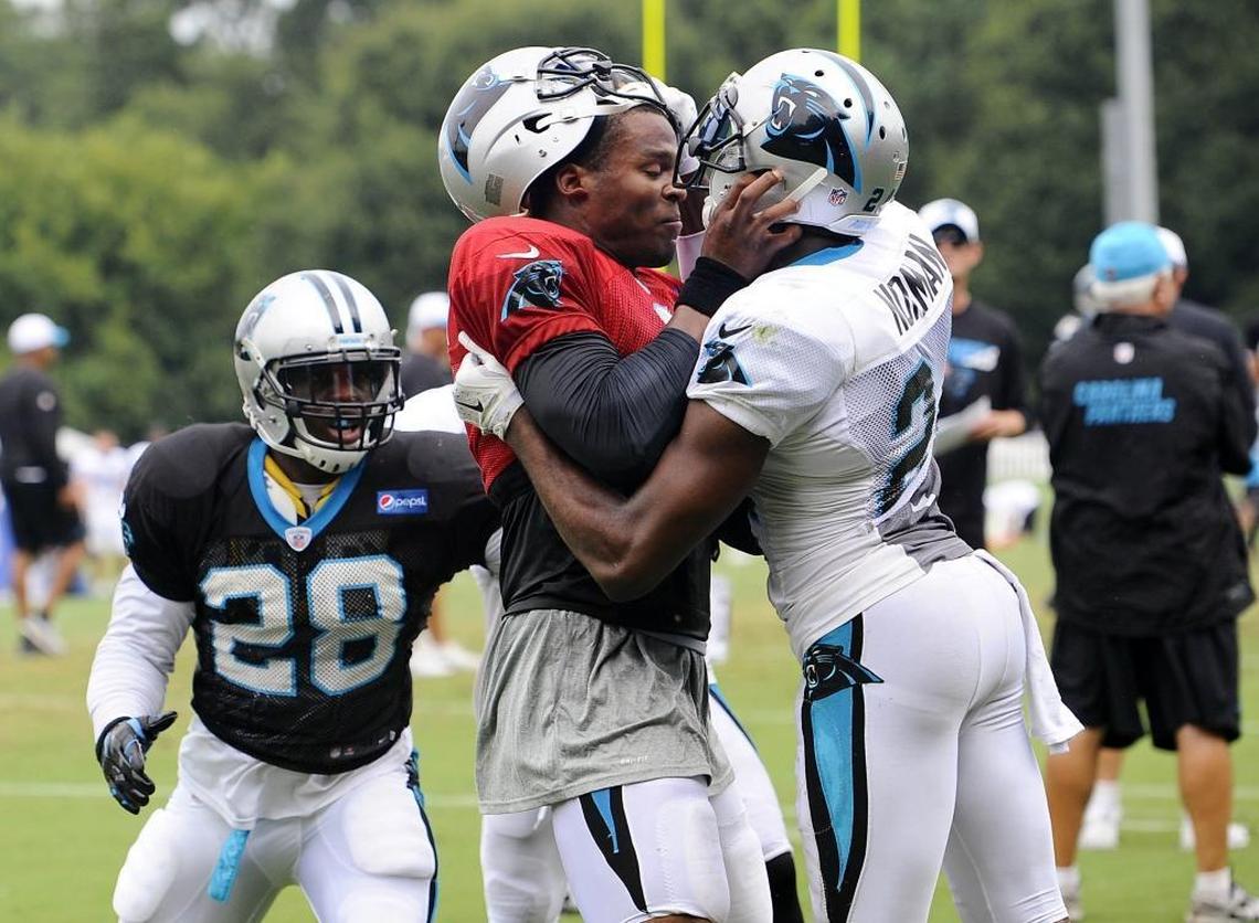 Cam Newton and Josh Norman fight it out at a training-camp scuffle in August 2015.