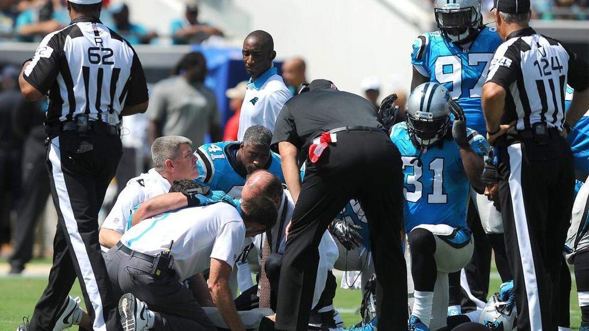 
Team personnel surround Carolina Panthers linebacker Luke Kuechly (59) on Sunday, September 13, 2015 at EverBank Field in Jacksonville, Fl. Kuechly sustained a concussion on the play and is now in the NFL's concussion protocol. 
