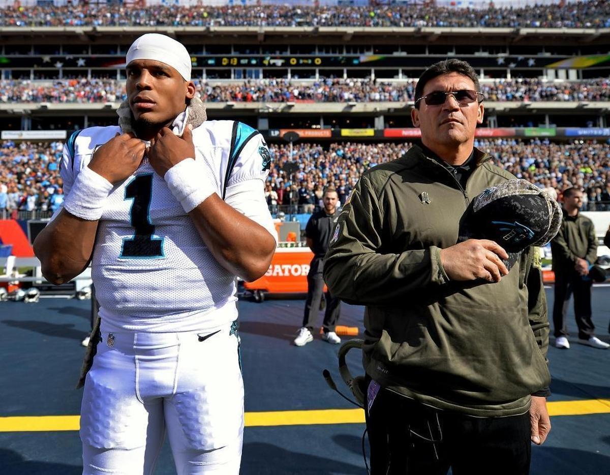 Carolina Panthers head coach Ron Rivera, right, and quarterback Cam Newton arrived together in 2011 and stayed together in Charlotte for most of nine years.
