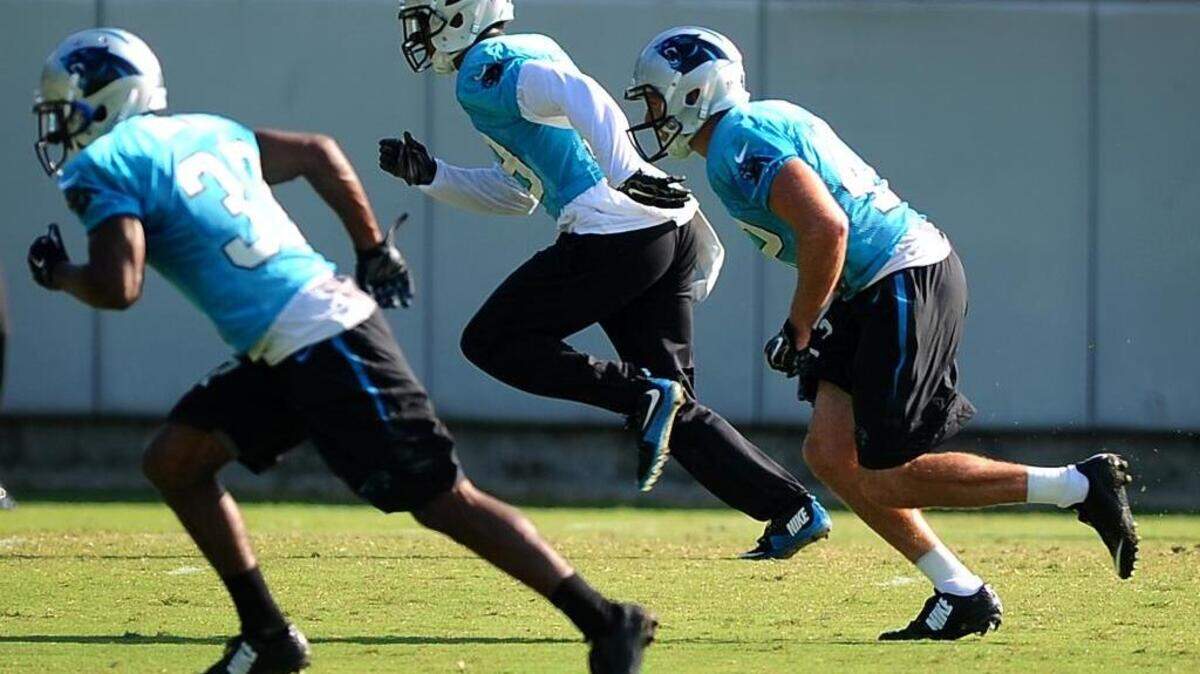 
Carolina Panthers safety Colin Jones, right, returned to practice Tuesday despite a groin injury that had the team fearing the worst. 
