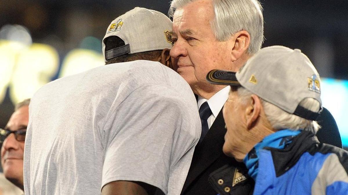 Linebacker Thomas Davis hugs Jerry Richardson following the Panthers' 49-15 win against Arizona in the NFC Championship Game in January. Wednesday, Richardson had successful shoulder surgery, the team announced.