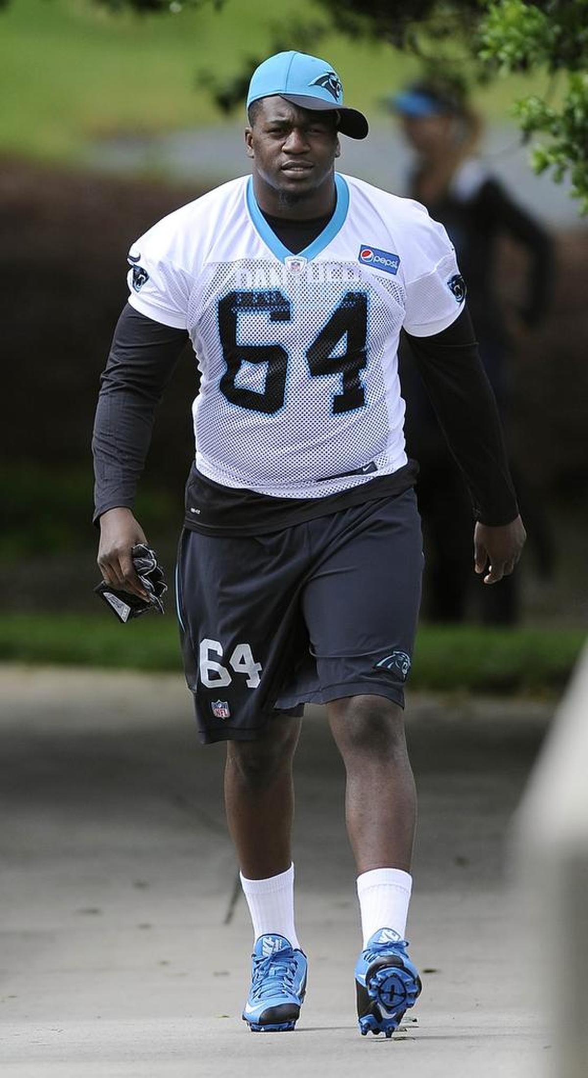 Carolina Panthers defensive end Bryan Cox Jr., an undrafted rookie out of Florida, heads to the practice field during the first session of the team’s rookie camp on May 5.