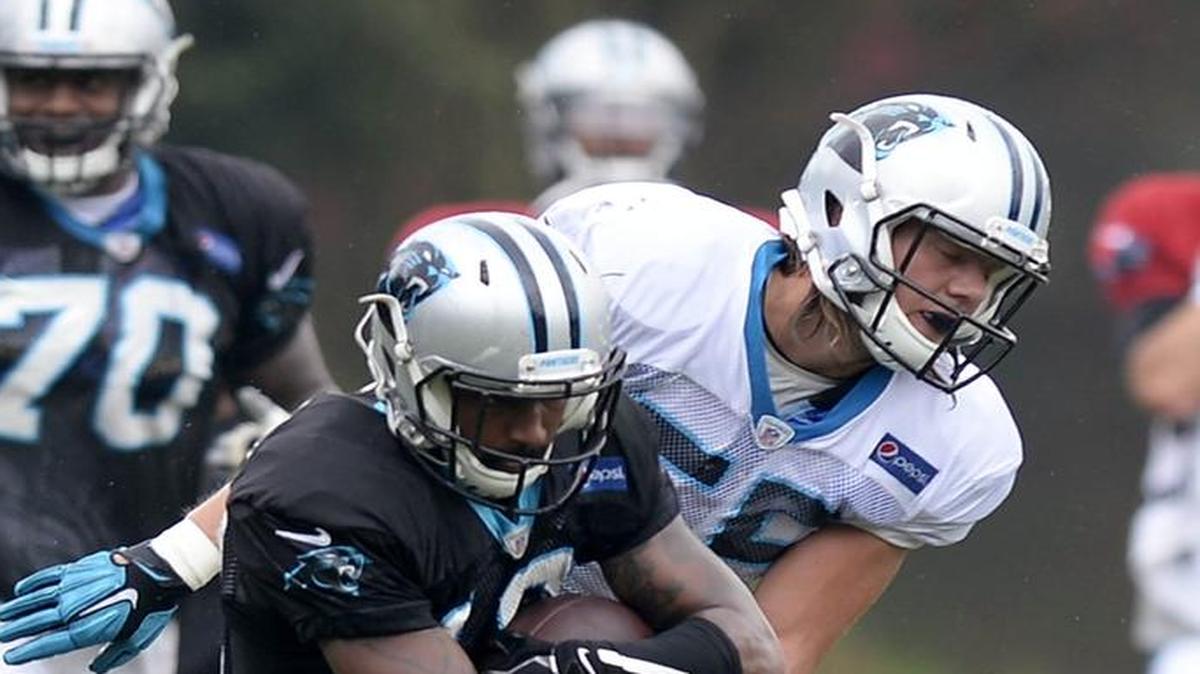 Carolina Panthers wide receiver Corey Brown (10) secures the ball against linebacker David Mayo (55) during Carolina Panthers Training Camp at Wofford College August 8, 2016.