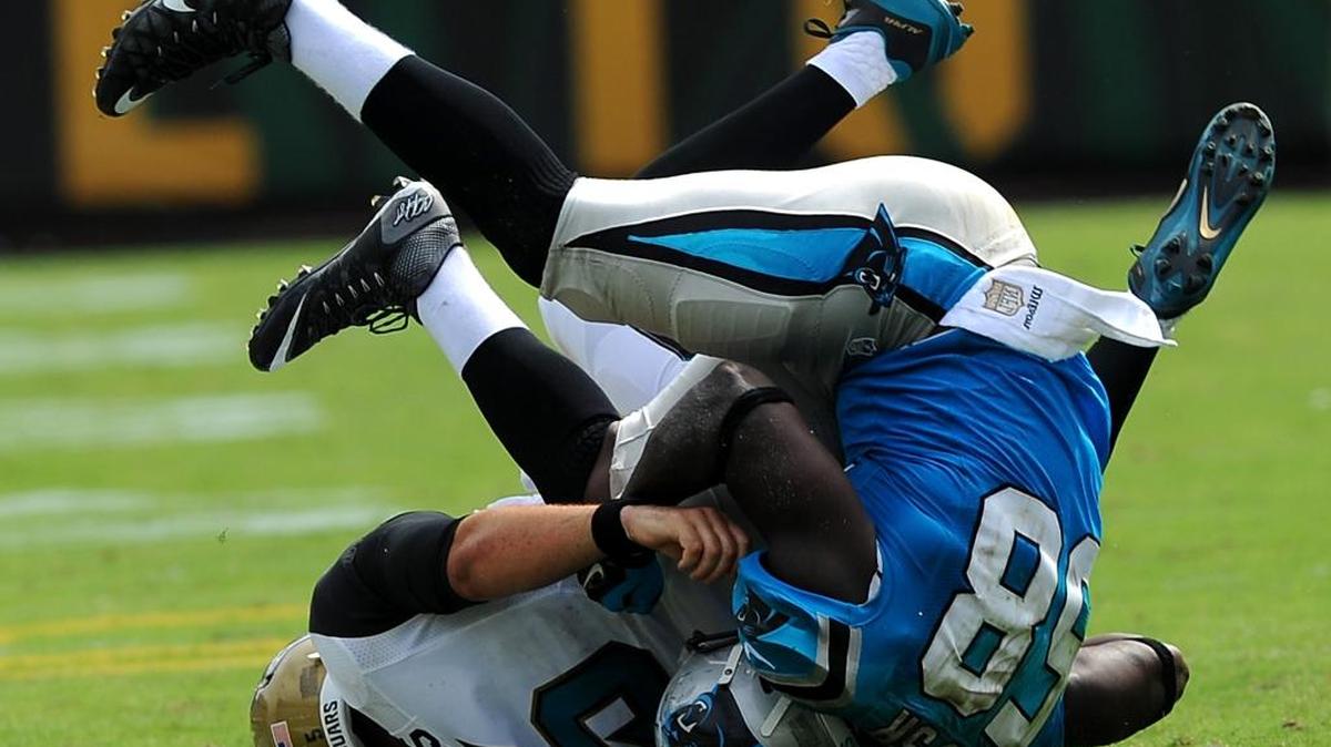 
Carolina Panthers linebacker Thomas Davis sacks Jacksonville Jaguars quarterback Blake Bortles. Panthers defensive coordinator Sean McDermott threw a lot of blitzes at Bortles, getting the corners, safeties and linebackers involved in the pressure schemes. 
