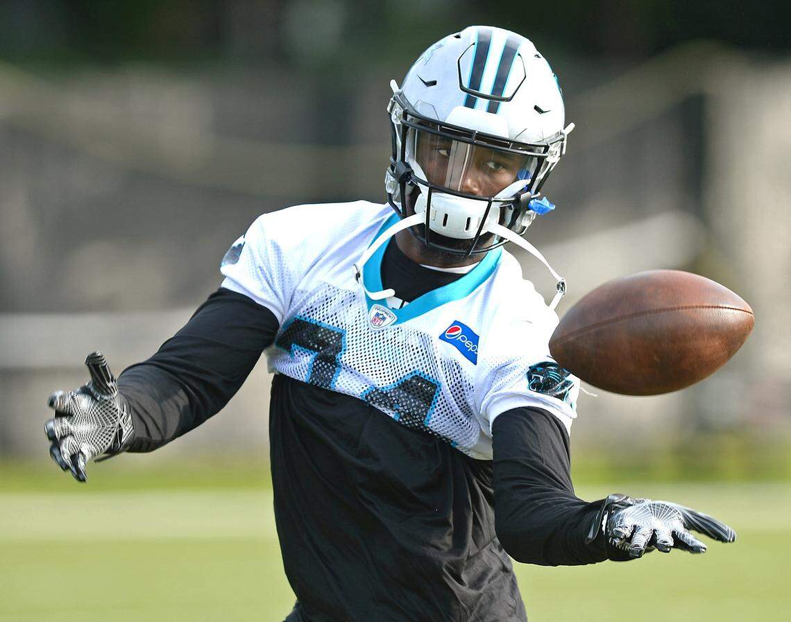 Carolina Panthers cornerback James Bradberry reaches out to catch a ball during practice on Thursday, June 14, 2018. Bradberry is the only cornerback who has been on the roster for the last two years, and the only starting defensive back who has remained over that time.