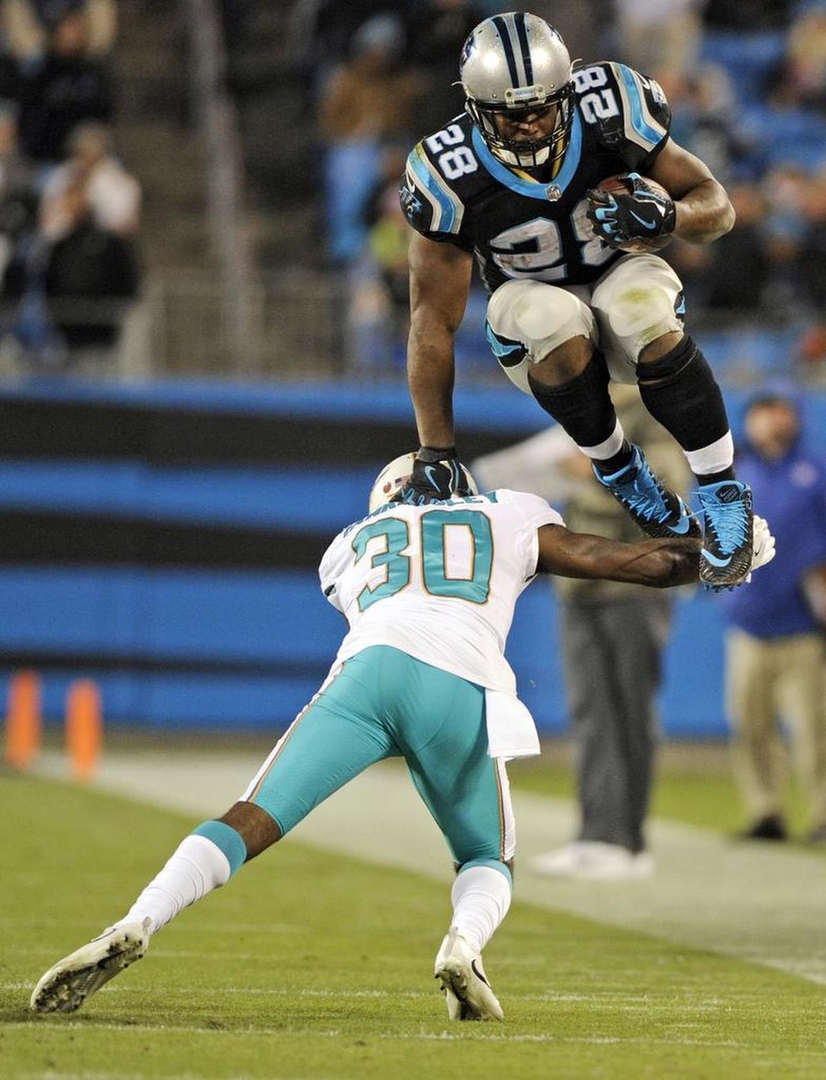 If Carolina Panthers running back Jonathan Stewart couldn’t go up the gut or around the edge in Monday night’s game, he was going right over somebody – as he did over Miami Dolphins cornerback Cordrea Tankersley on this play.