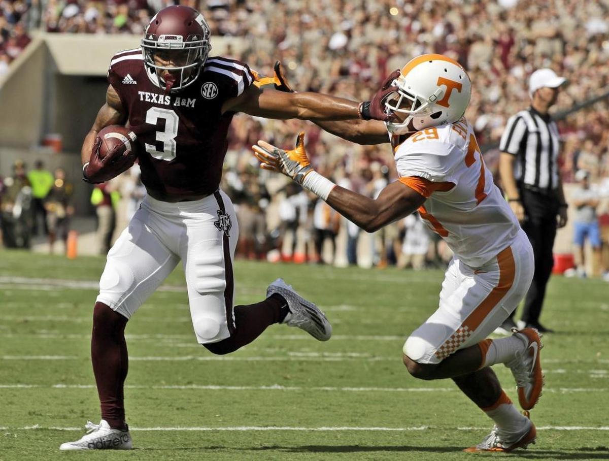 FILE - In this Oct. 8, 2016, file photo, Texas A&M wide receiver Christian Kirk (3) breaks away from Tennessee defensive back Evan Berry (29) to score a touchdown after catching a pass during the first half of an NCAA college football game in College Station, Texas. (AP Photo/David J. Phillip, File)